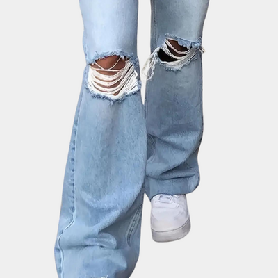 Grethe | Høytaljede flared jeans med slitte detaljer