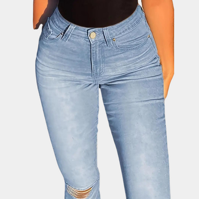 Grethe | Høytaljede flared jeans med slitte detaljer