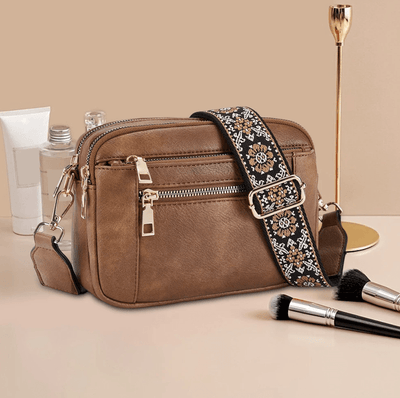Arvida | Crossbody-veske med trykt stropp