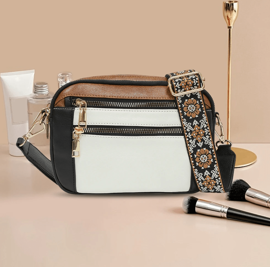 Arvida | Crossbody-veske med trykt stropp