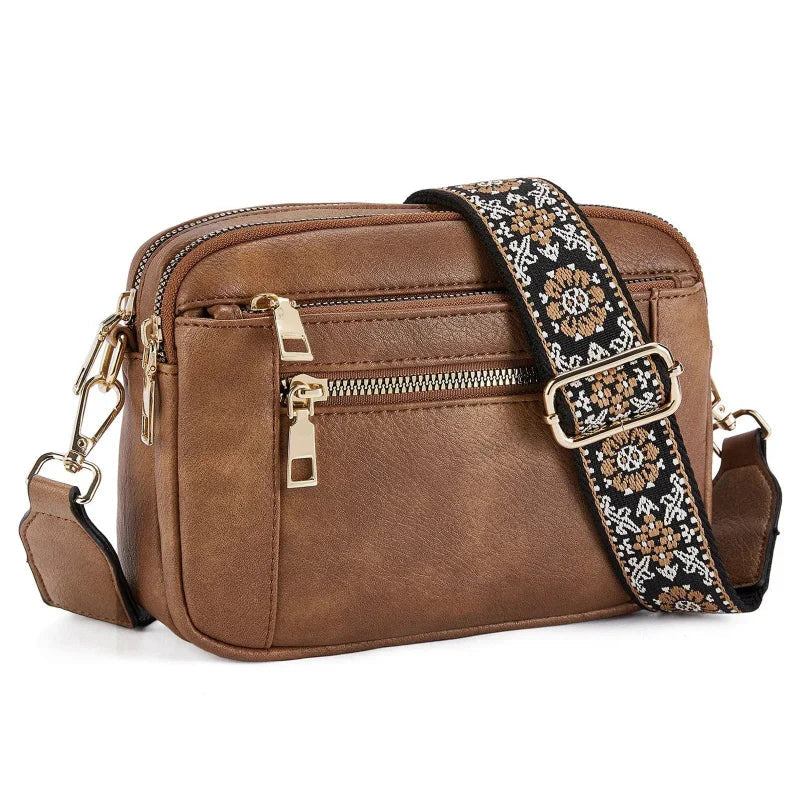 Arvida | Crossbody-veske med trykt stropp