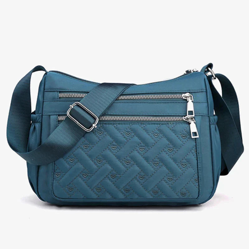 Aranya | Nylon skulderveske med budbringer