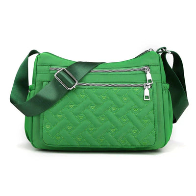 Aranya | Nylon skulderveske med budbringer