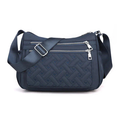 Aranya | Nylon skulderveske med budbringer