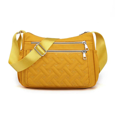 Aranya | Nylon skulderveske med budbringer